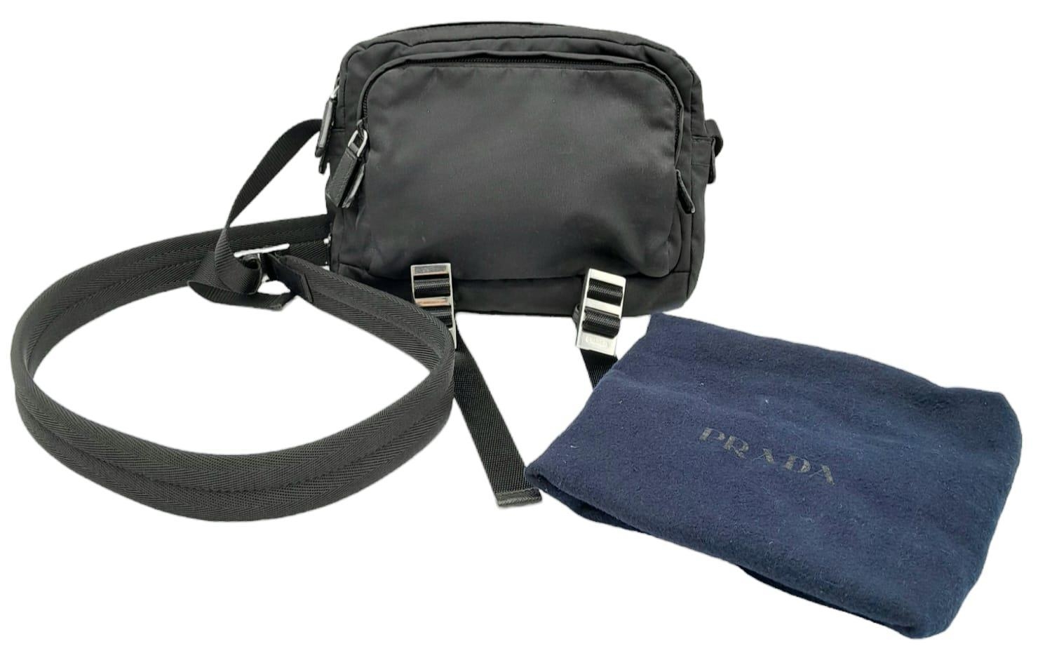 A Prada Black 'Tessuto Montagna' Crossbody Bag. Textile exterior with silver-toned hardware, a - Image 8 of 9