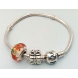 A Pandora Silver Charm Bracelet with Two Charms. 22g