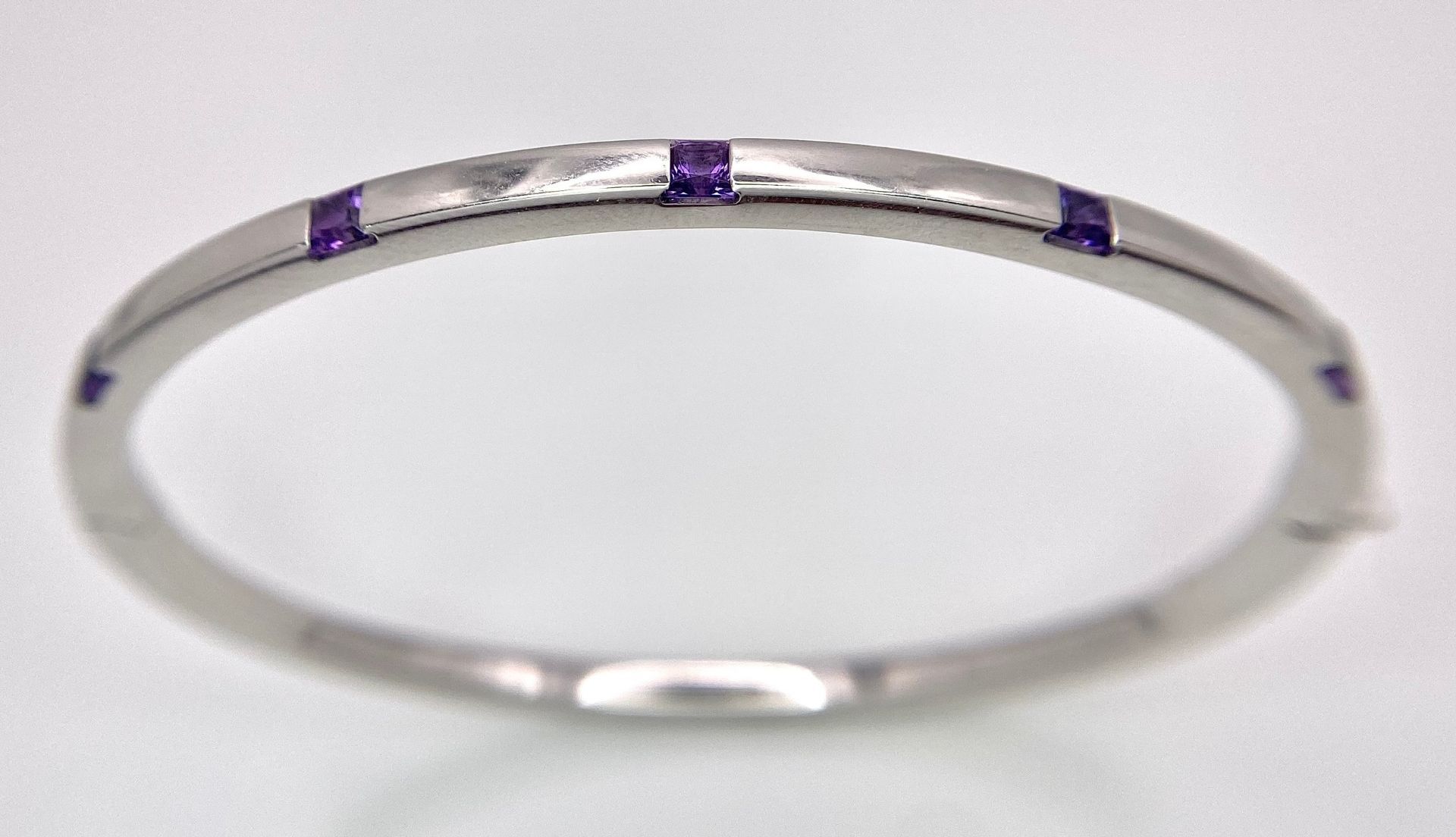 A 9K WHITE GOLD AMETHYST SET BANGLE - BRAND NEW! 7.4G.