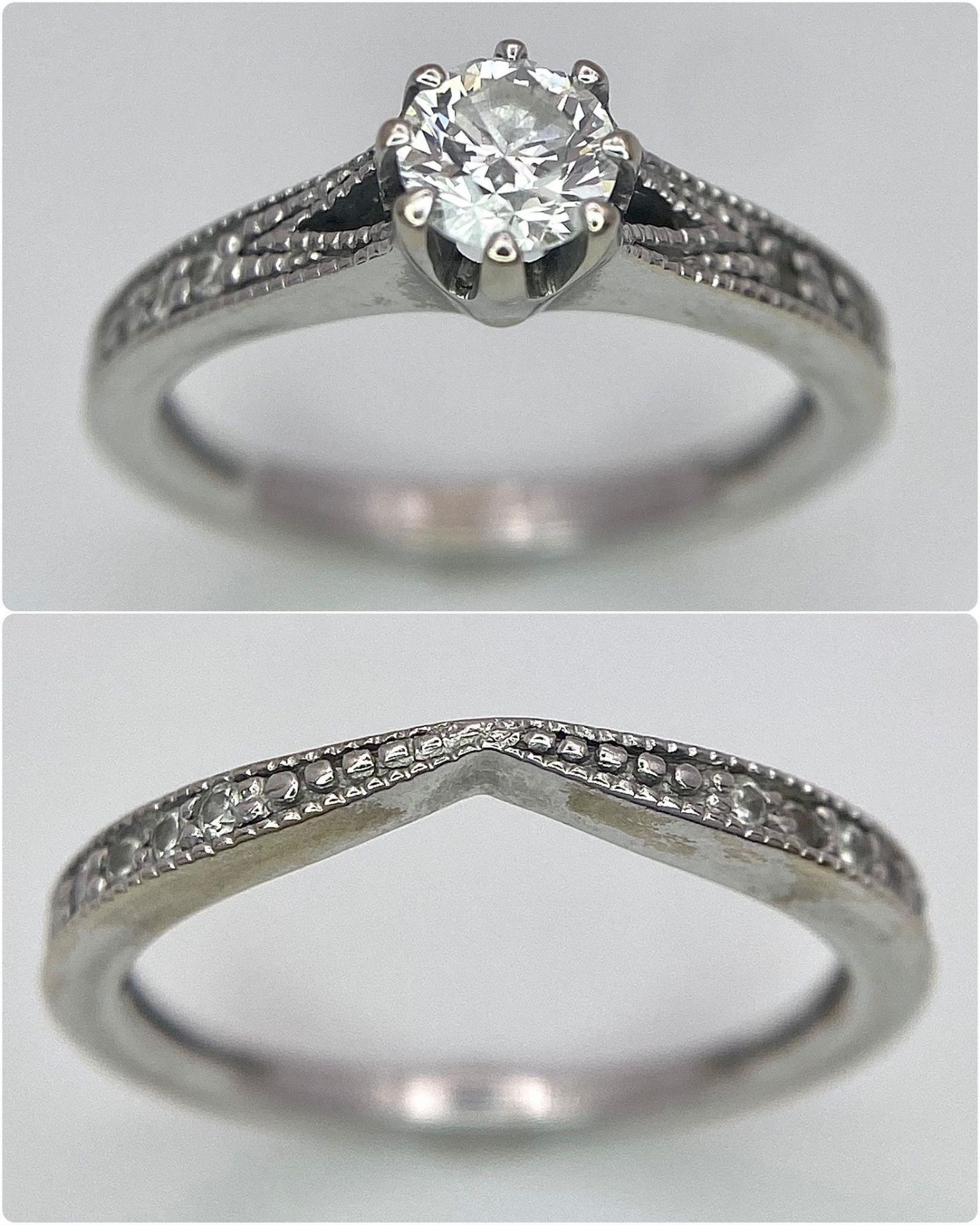 Two Different Style 18K White Gold Rings. A 0.50ct brilliant cut central diamond with diamond