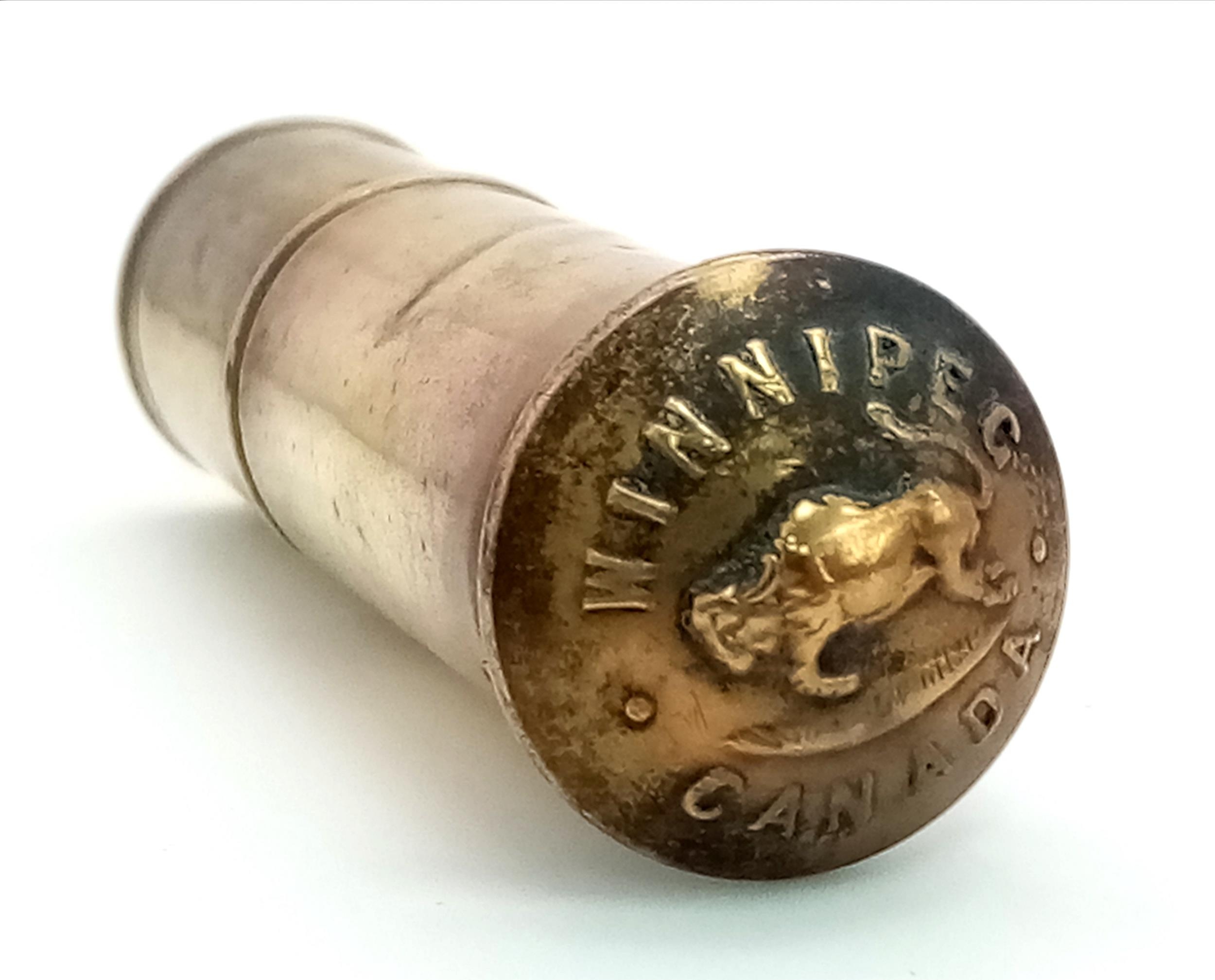 A real rare “Been There” WW1 Trench Art Lighter with a button from the Canadian 27th Battalion