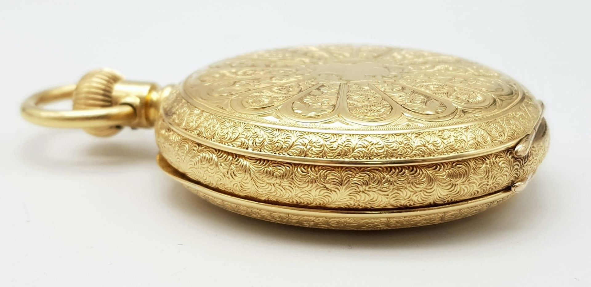 An Antique Waltham 18K Gold Full Hunter Pocket Watch. The case is ornately decorated in a floral - Image 11 of 13