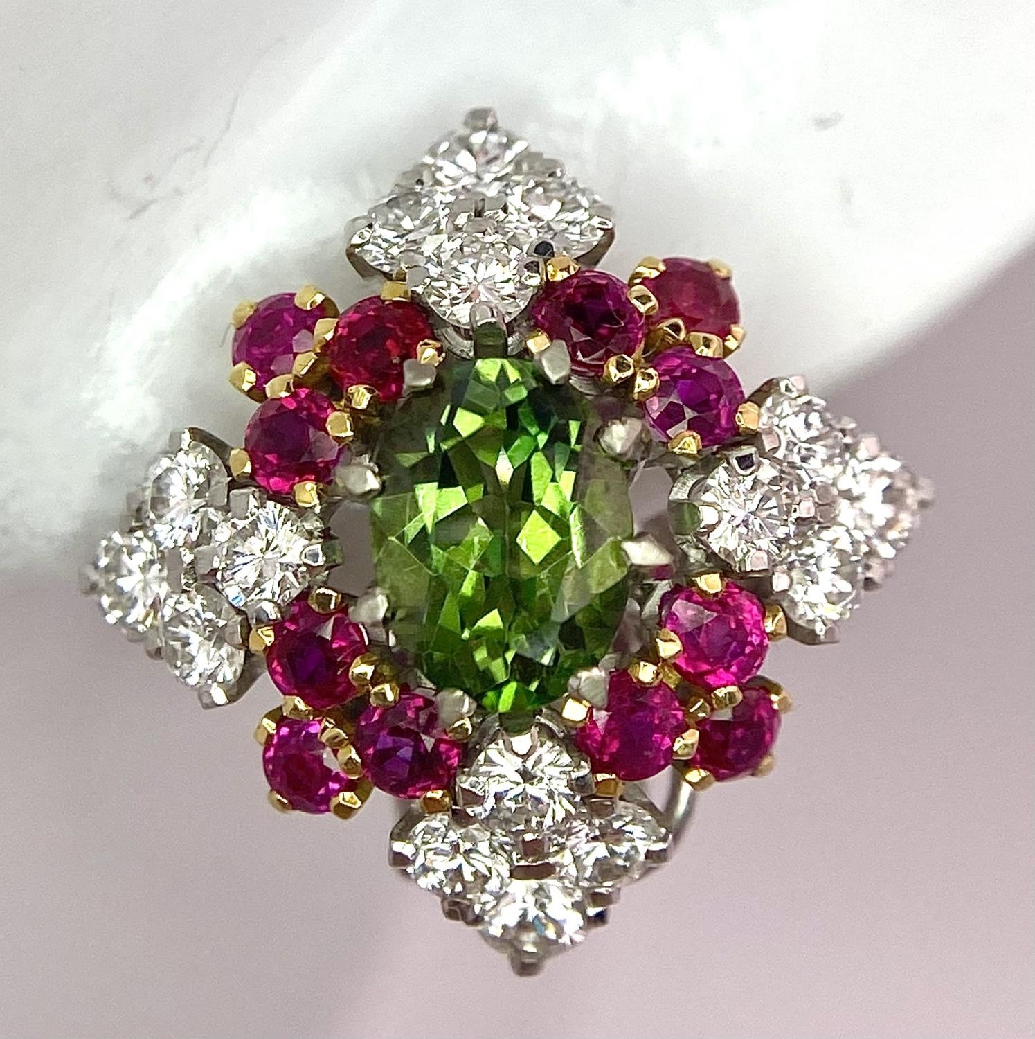 A Pair of Platinum, Emerald, Ruby and Diamond Earrings. Each earring containing a 1.5ct oval cut - Image 2 of 5
