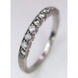 A Brown's Designer 18K White Gold and Diamond Half Eternity Ring. Size M. Comes with a Browns box.