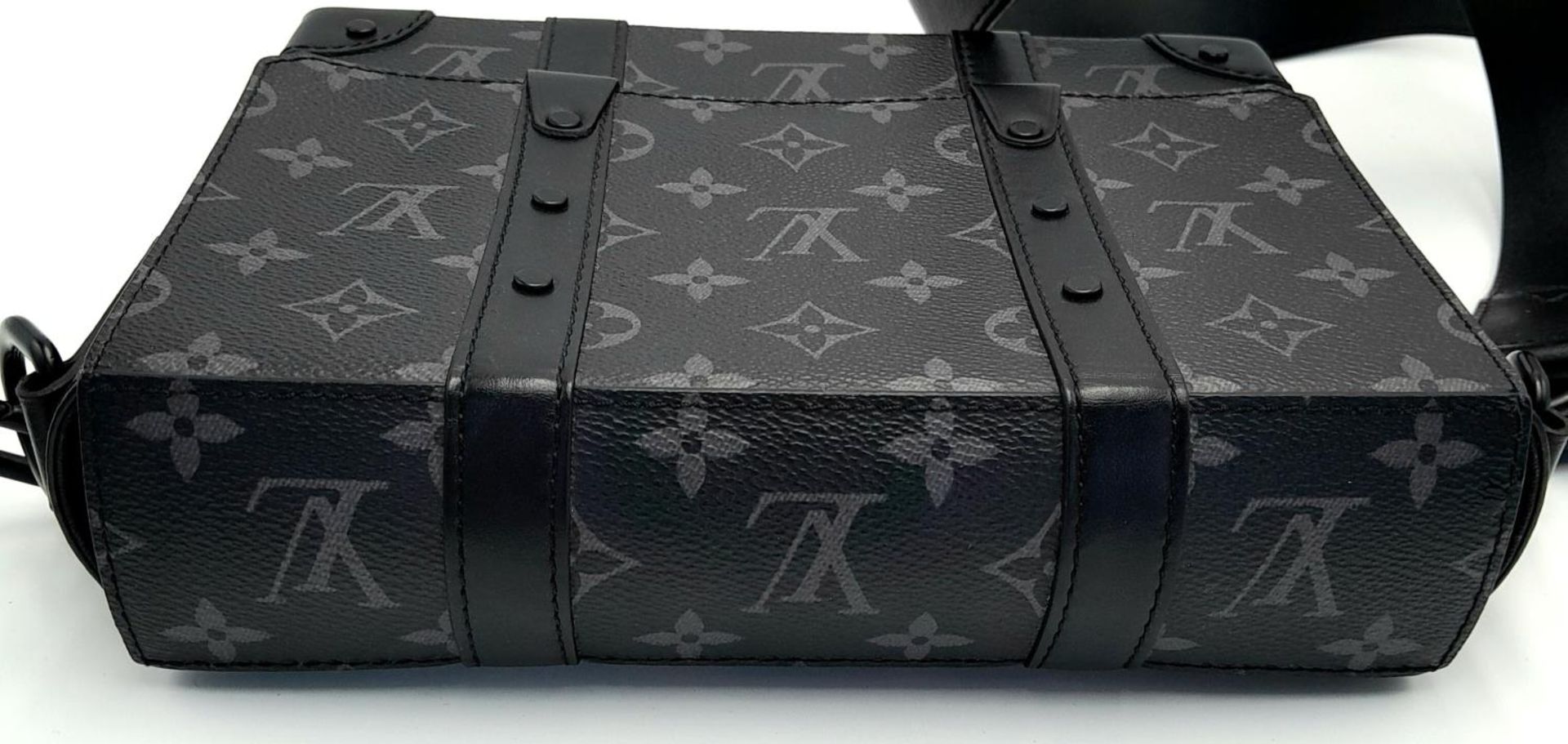 A Louis Vuitton Black Eclipse Trunk Messenger Bag. Monogramed canvas exterior with black-toned - Image 5 of 10