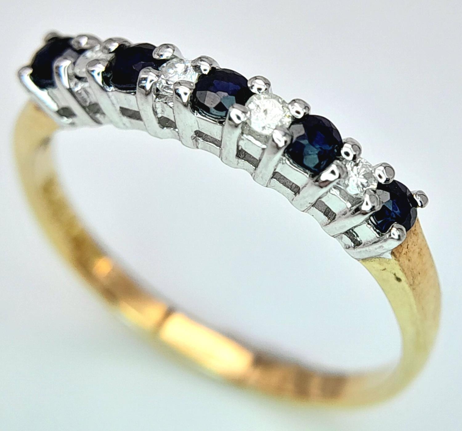 A 9K YELLOW GOLD DIAMOND & SAPPHIRE RING 1.4G SIZE M. ref: SPAS 9027