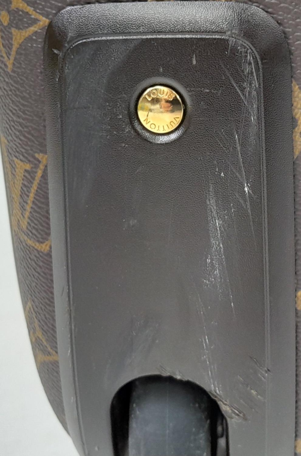 A Louis Vuitton Monogram Pegase Suitcase. Durable leather exterior with gold-toned hardware. Front - Image 9 of 16