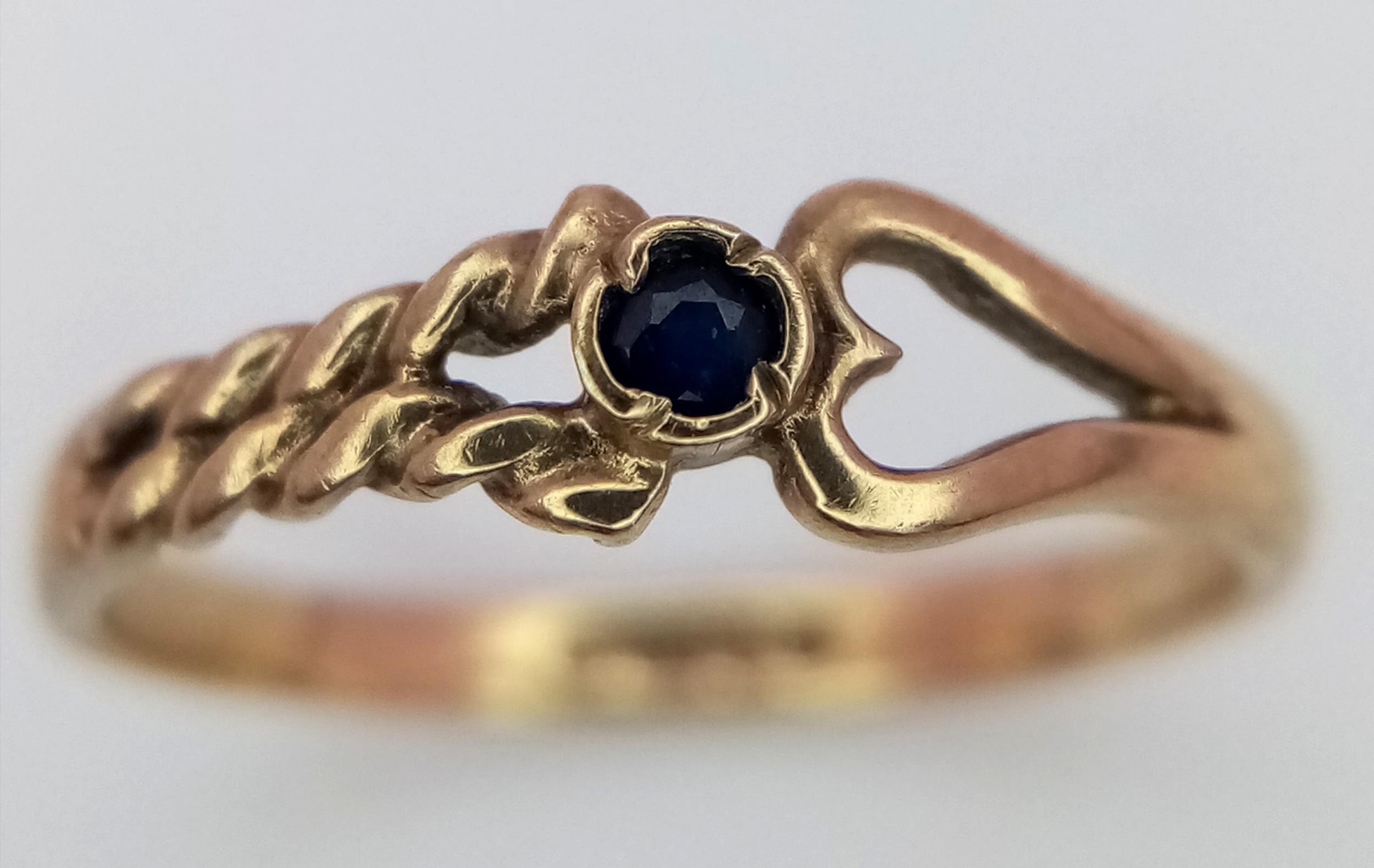 A 9K Yellow Gold and Sapphire Love Ring. Size J. 1.1g weight. - Image 2 of 5