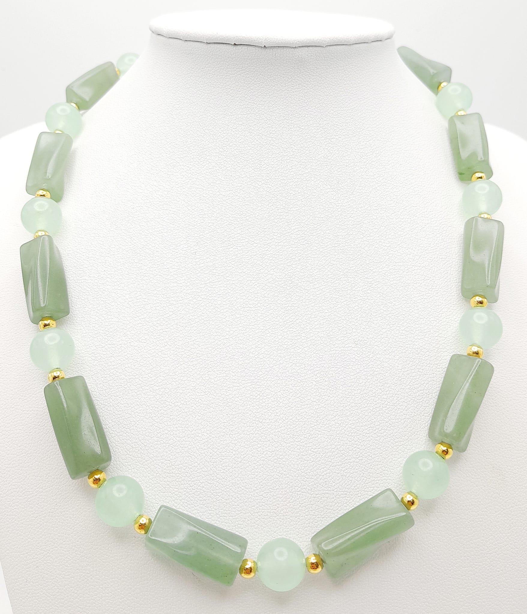A high-quality light green, semi-translucent, jade necklace, bracelet and earrings set. Necklace - Image 3 of 5