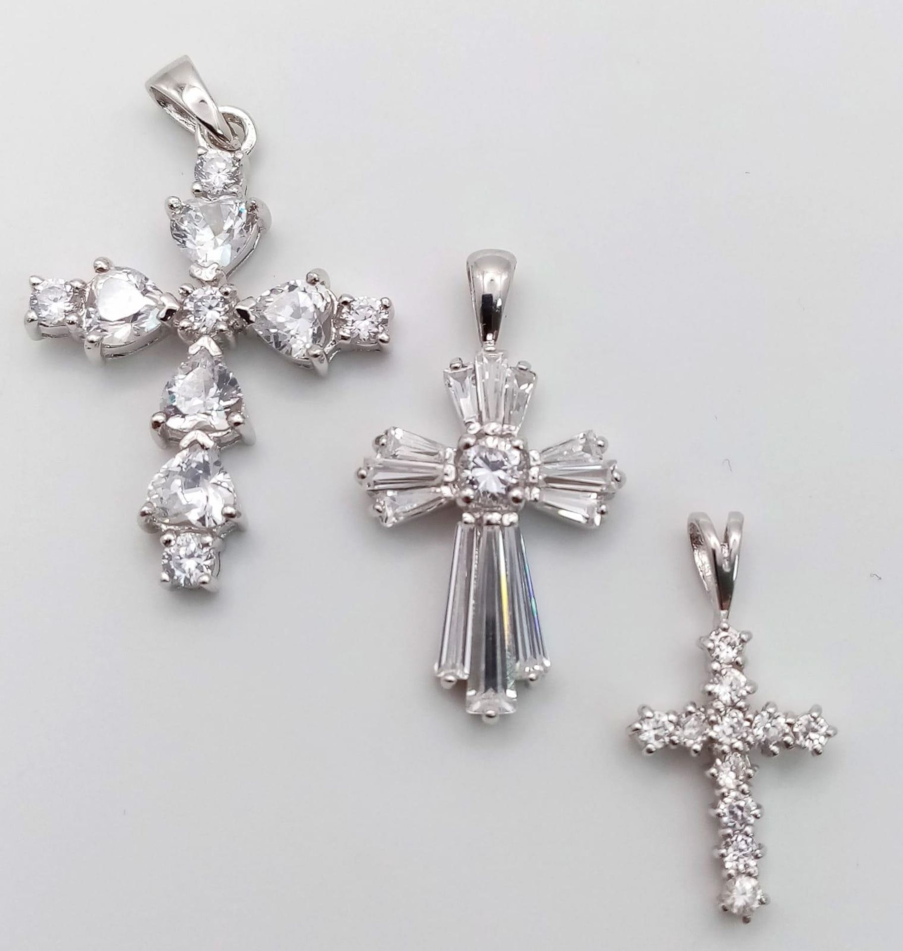 3 X STERLING SILVER STONE SET CROSSES PENDANTS, WEIGHT 8.1G, SEE PHOTOS FOR DETAILS