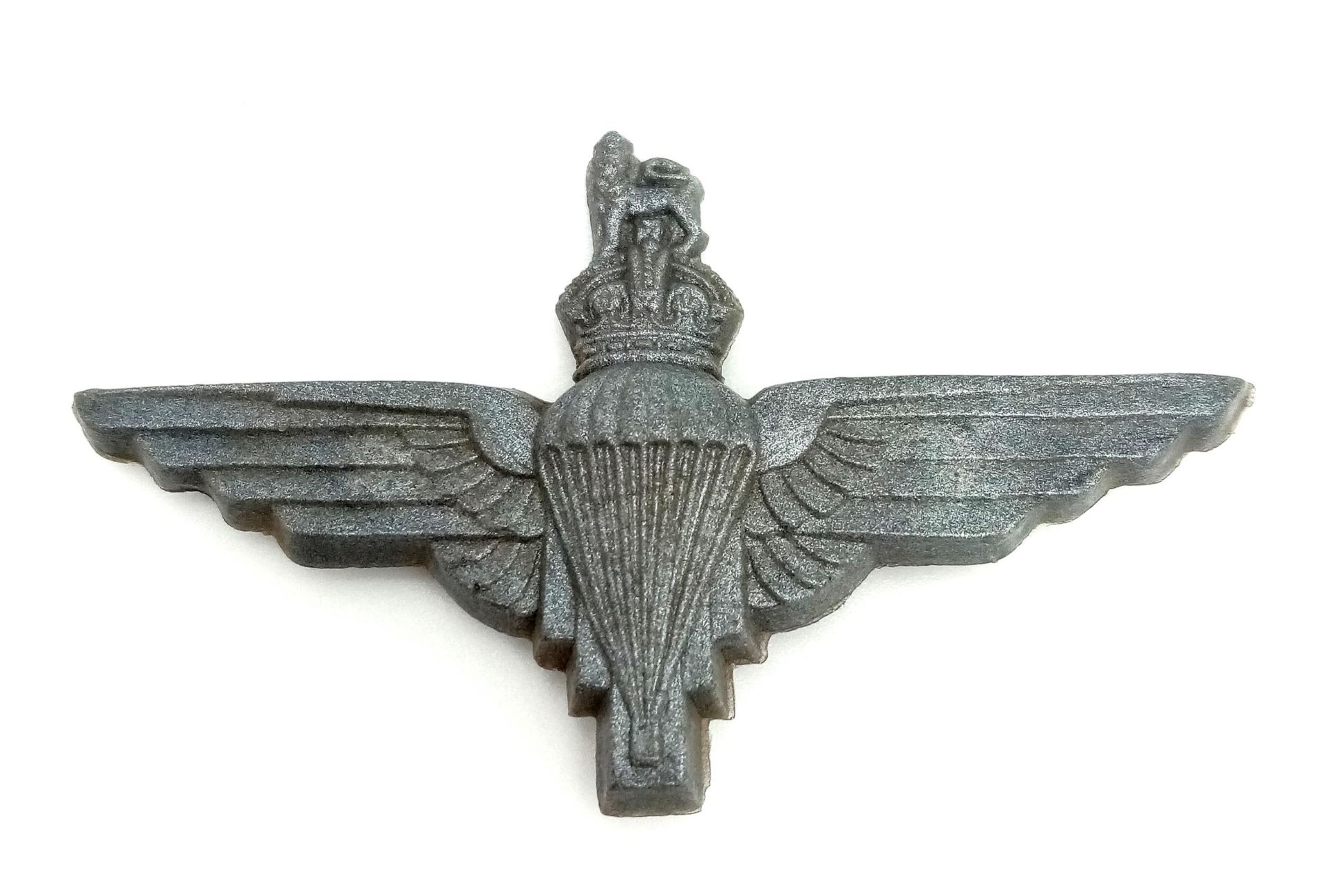 WW2 Plastic (Cellulose Acetate) Economy Issue Parachute Regiment Cap Badge.