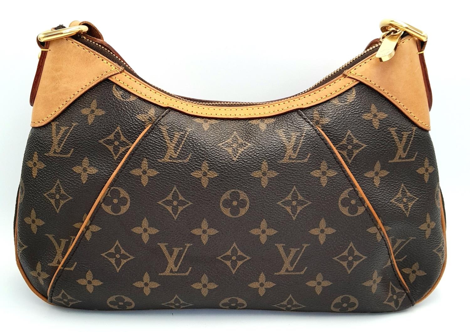 A Louis Vuitton Thames Shoulder Bag. Monogramed canvas exterior with gold-toned hardware, adjustable - Image 2 of 9