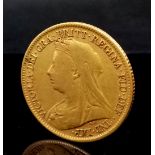 An 1897 Queen Victoria 22K Gold Half Sovereign Coin.