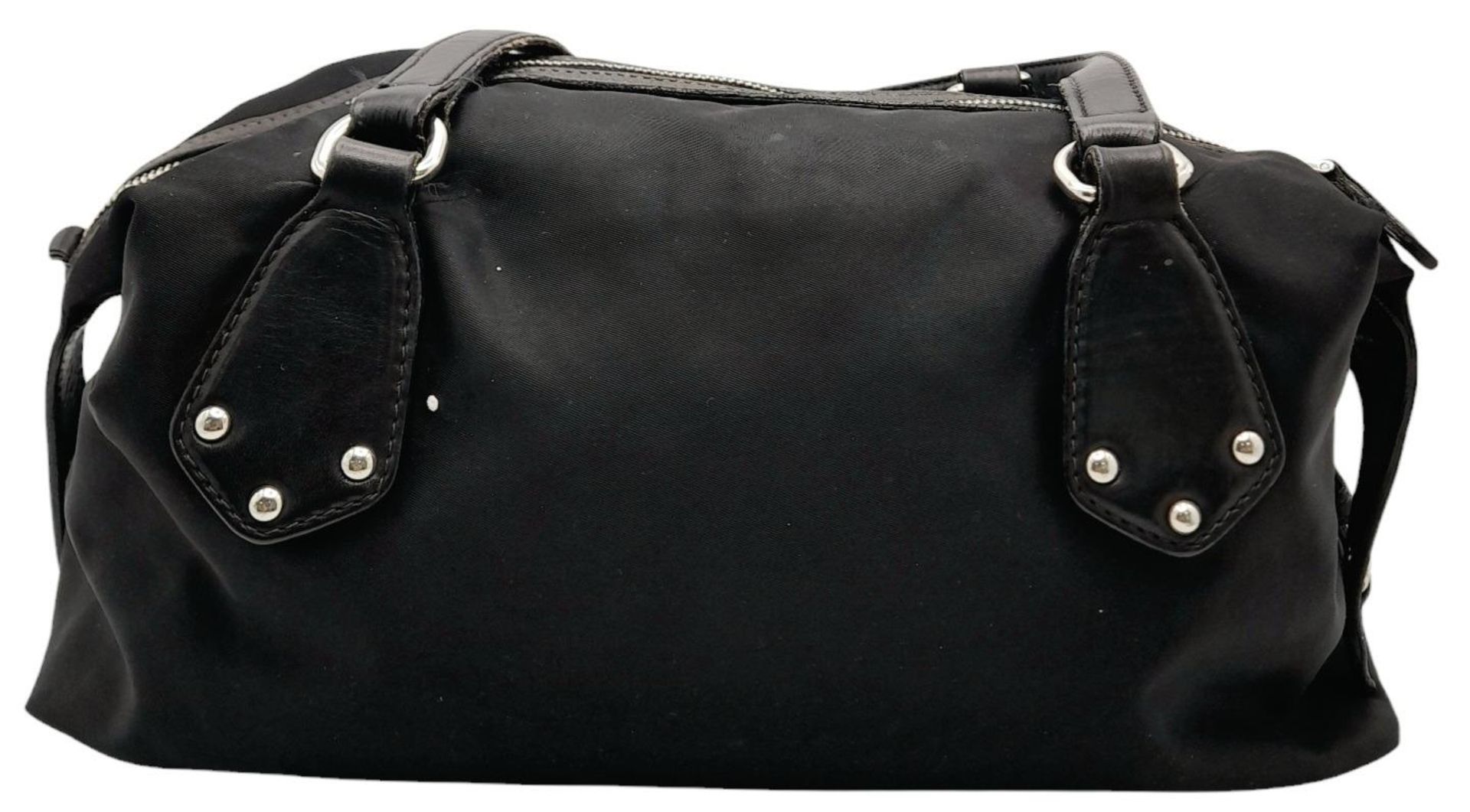 A Prada Black Tessuto Satchel. Textile exterior with leather trim, silver-tone hardware, a top zip - Image 2 of 7