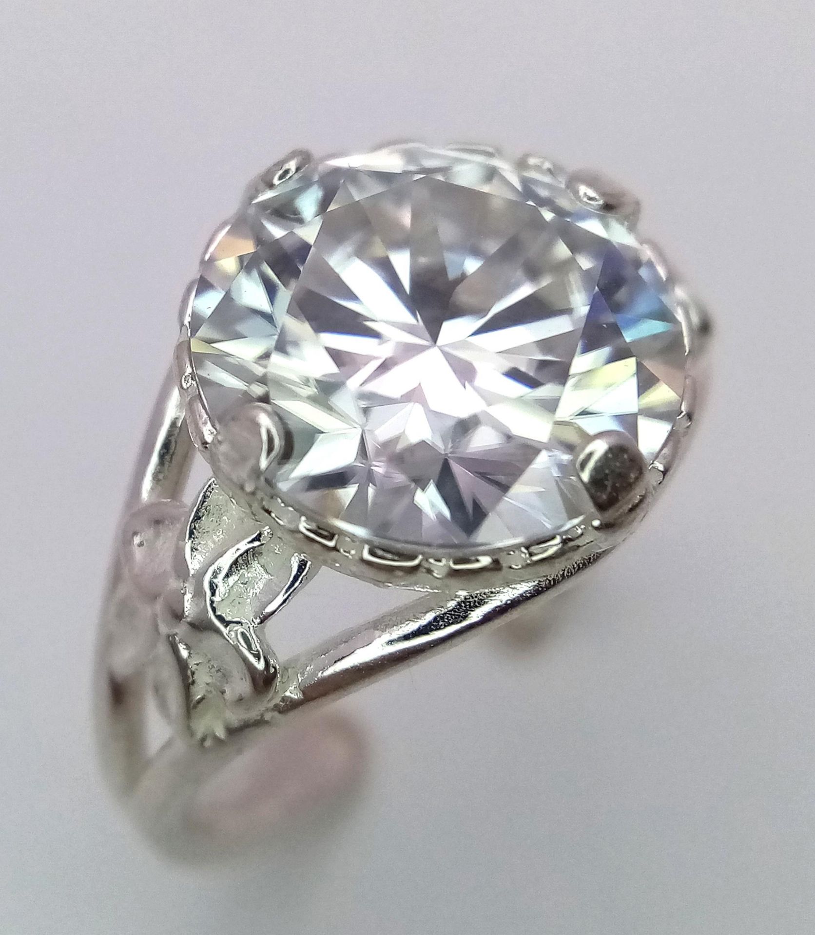 A 5ct Moissanite and 925 Silver Open-Ended Ring. Comes with a GRA certificate.