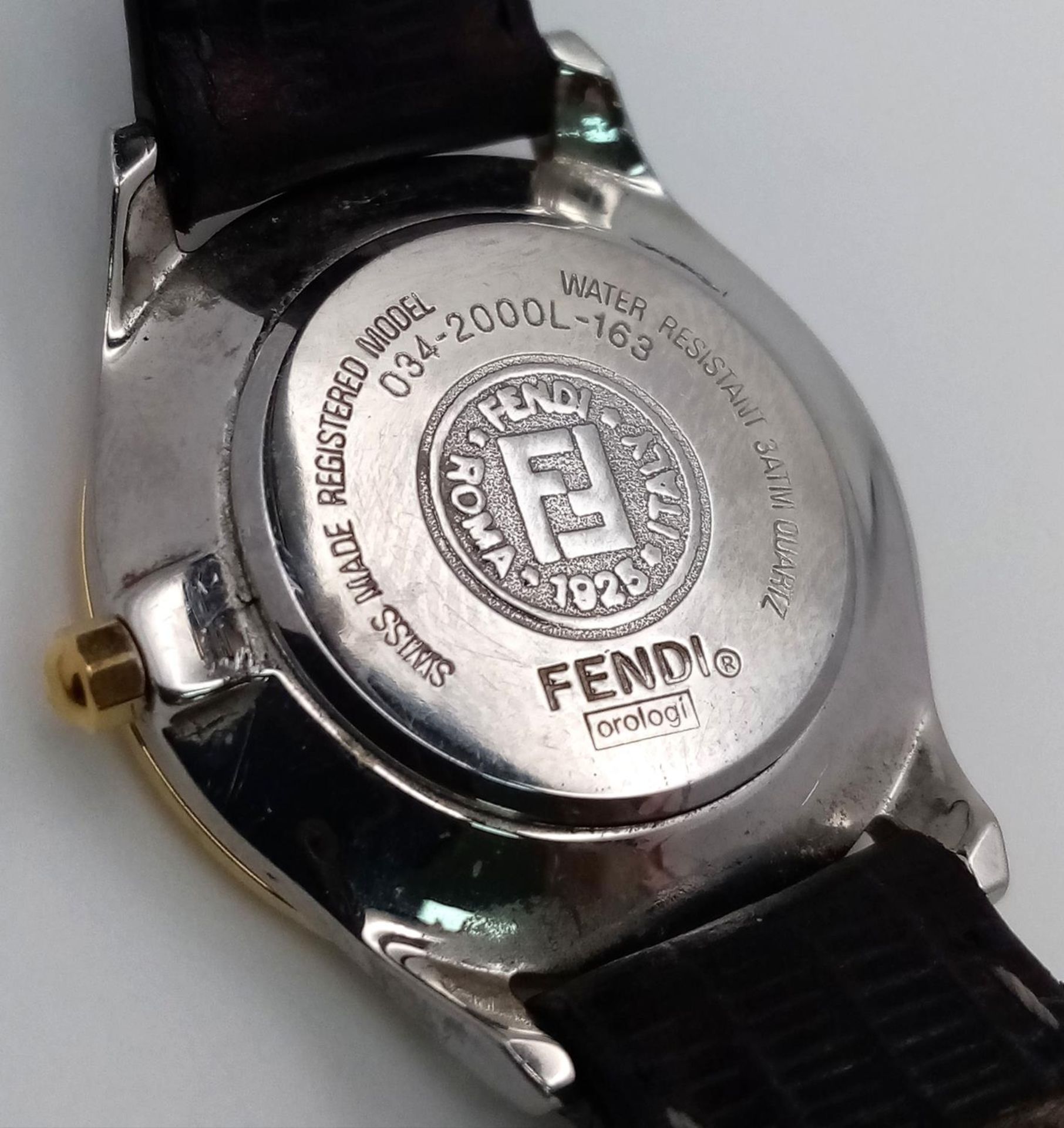 A Fendi Designer Quartz Ladies Watch. Black leather strap. Gilded circular case - 26mm. In working - Image 7 of 7