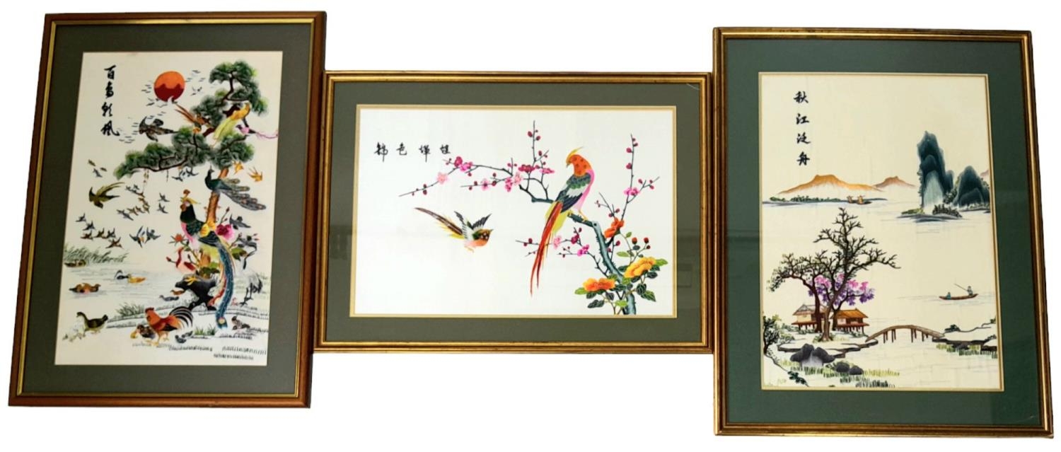 Three Asian Hand-Embroidered Silk Pictures in Frames. Colourful birds and a village scene. 54 x 70cm