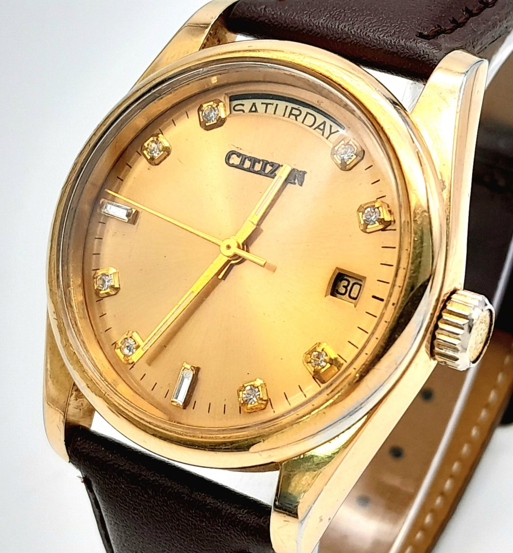 A Citizen Automatic Stone Set Watch. Brown leather strap. Gold plated case - 36mm. Gold tone dial - Image 2 of 6