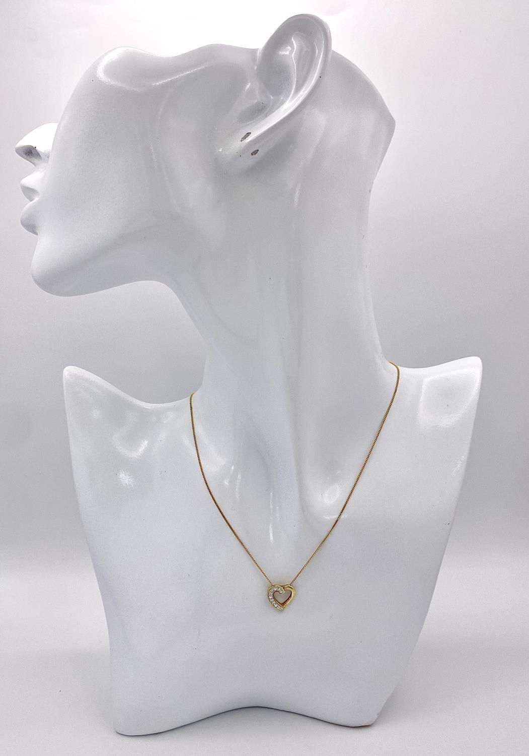 An Evoke Gilded Silver and Zircon Earring and Necklace Set. In original packaging. - Image 5 of 7