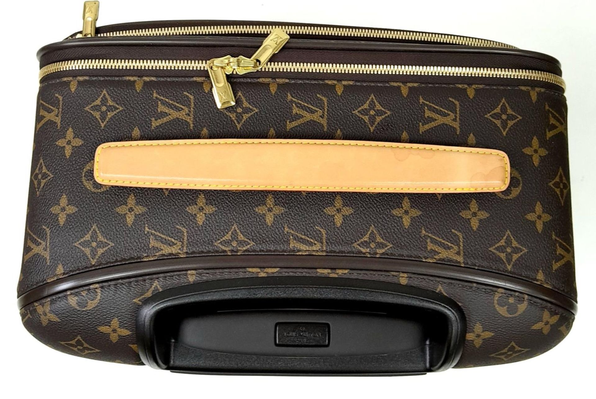 A Louis Vuitton Monogram Pegase Suitcase. Durable leather exterior with gold-toned hardware. Front - Image 4 of 16