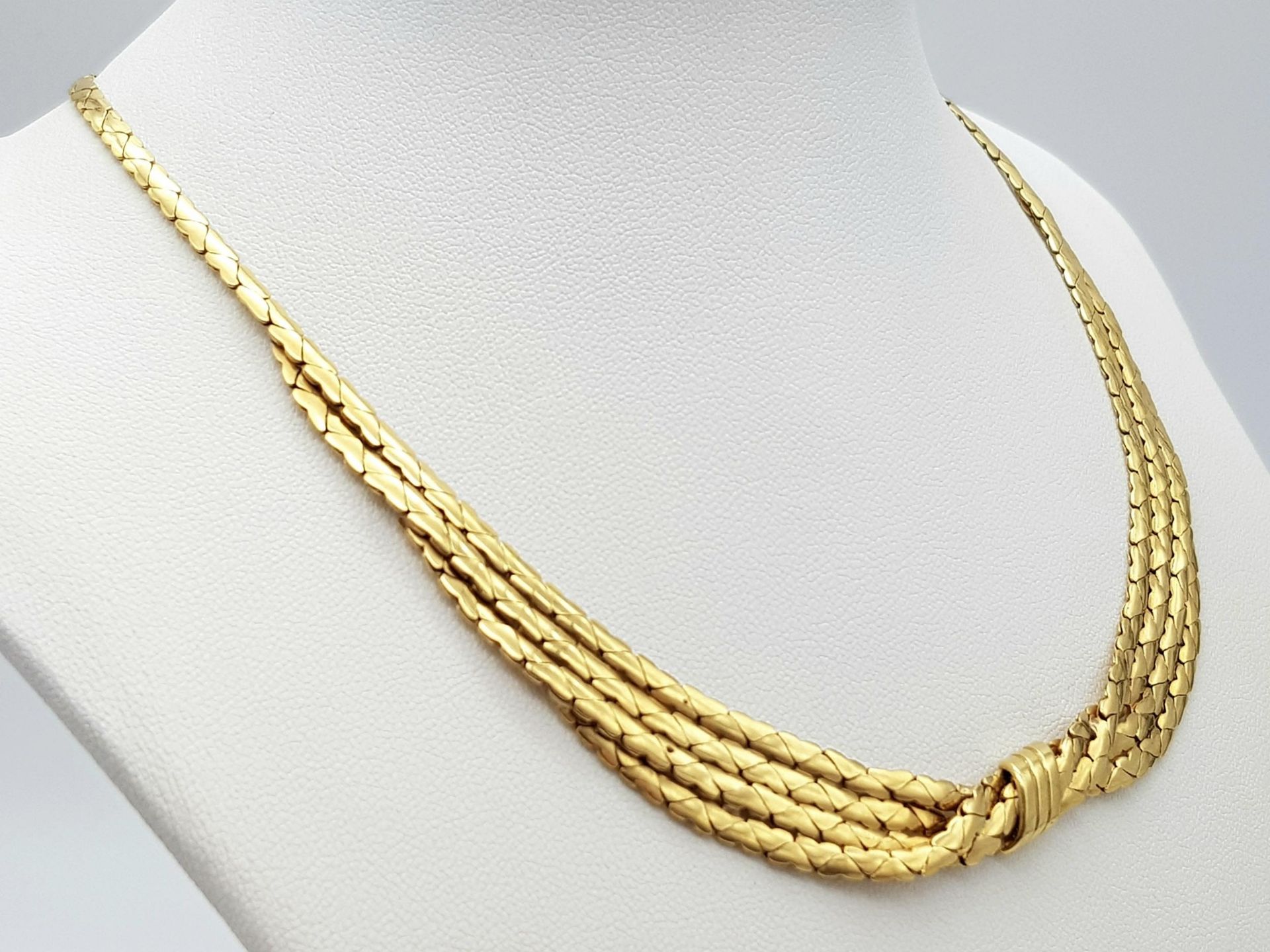 A Stylish Italian 18K Yellow Gold Choker Necklace. A single to a four row centre with buckle - Image 2 of 6