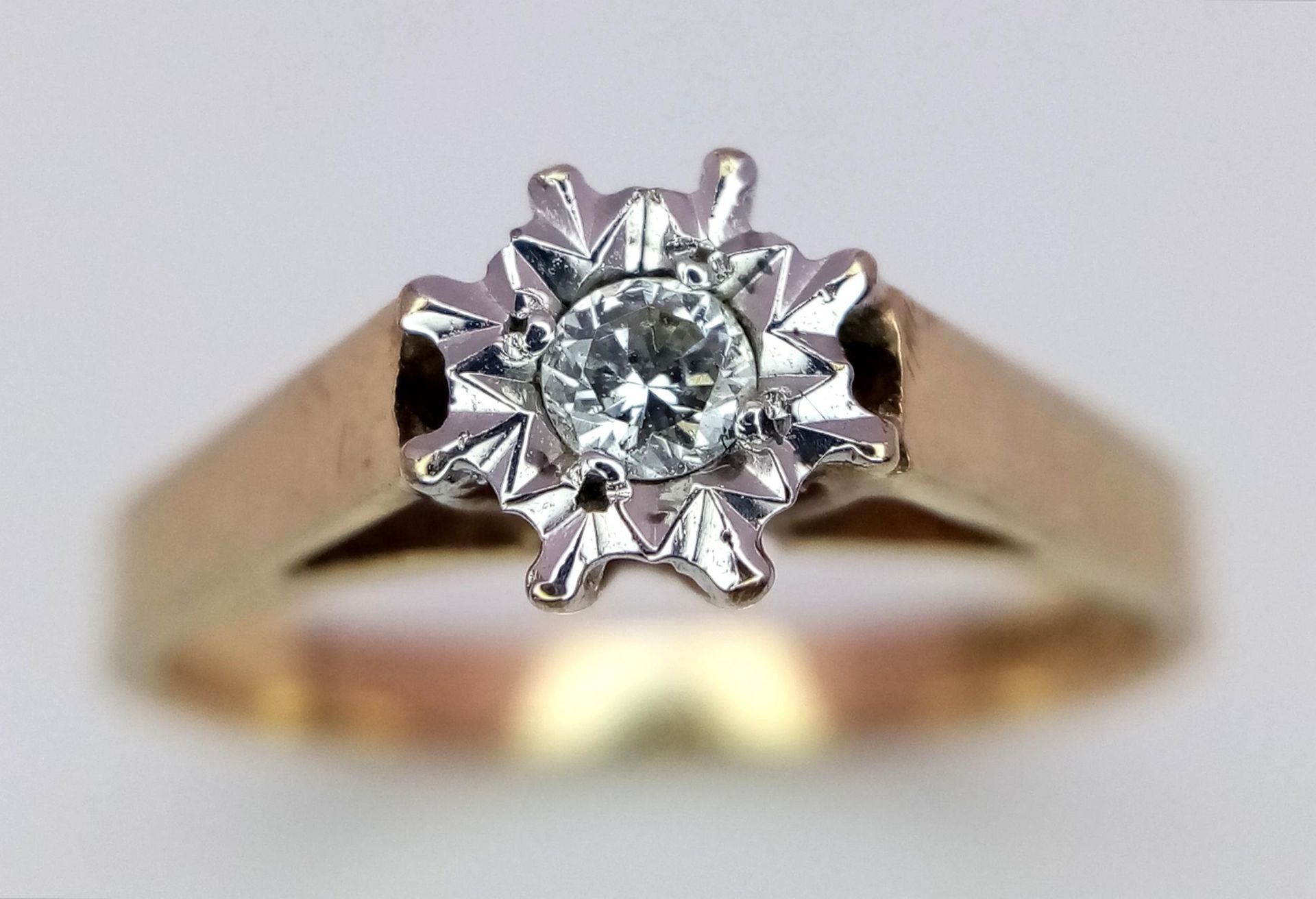 A 9K Yellow Gold Diamond Solitaire Ring. 0.15ct. Size K. 1.9g total weight. - Image 2 of 6
