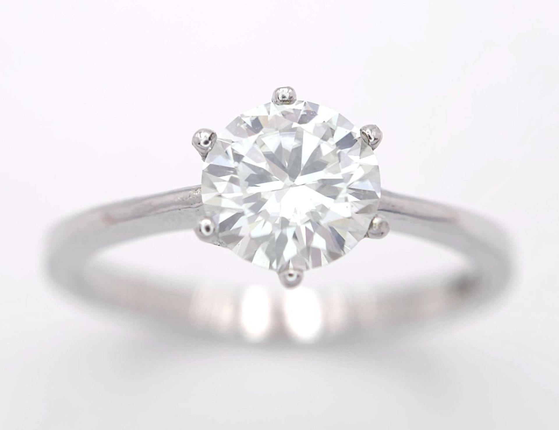 A 1ct Moissanite 925 Silver Ring. Size N. Comes with a GRA certificate.
