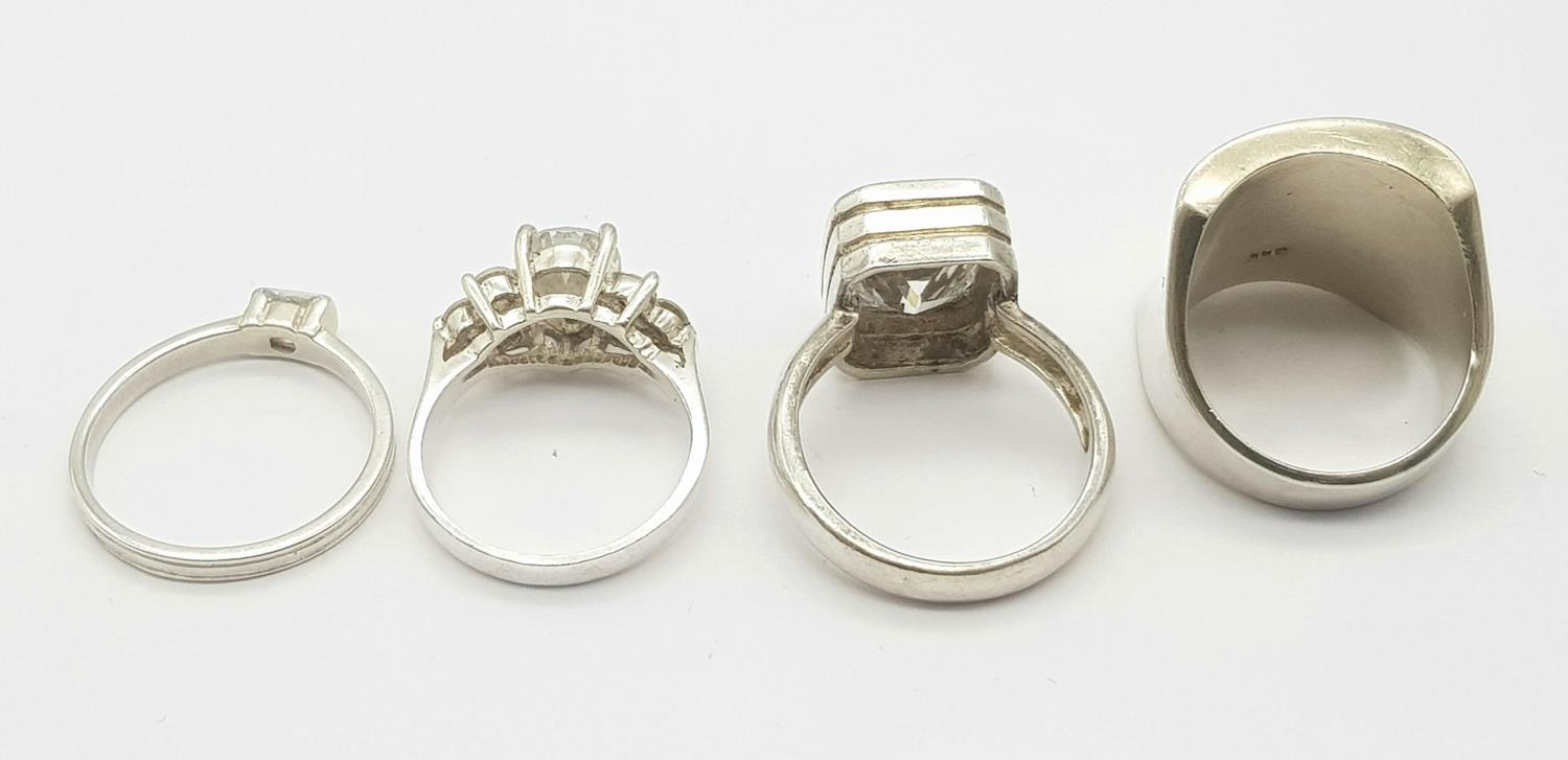 A Selection of 4 sterling silver rings, some set with cubic zirconia, sizes N-R, total weight 28.3g. - Image 6 of 6
