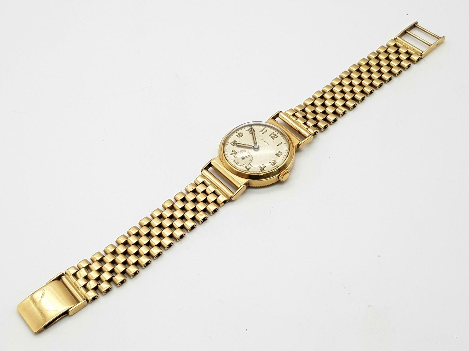 A Vintage (1950s) Mappin and Webb 9K Gold Watch. 9K gold bracelet and case - 28mm. Patinated dial - Image 7 of 9