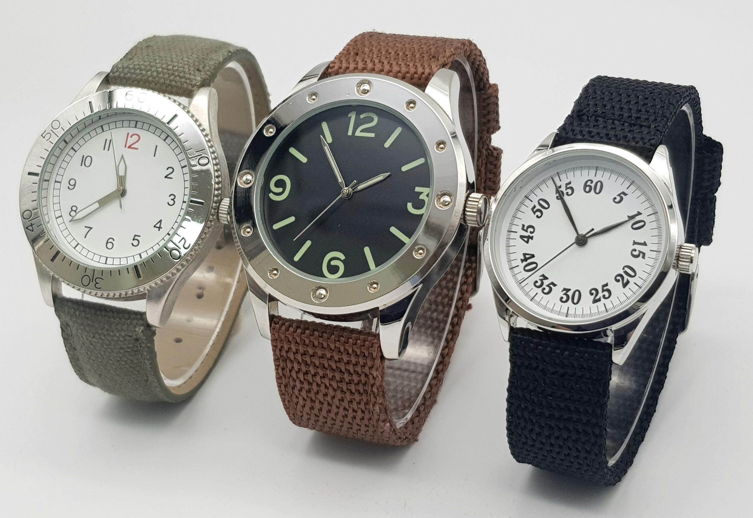 Three Unworn Military Homage Watches Comprising; 1) A 1940’s Design British RAF Navigator Watch (