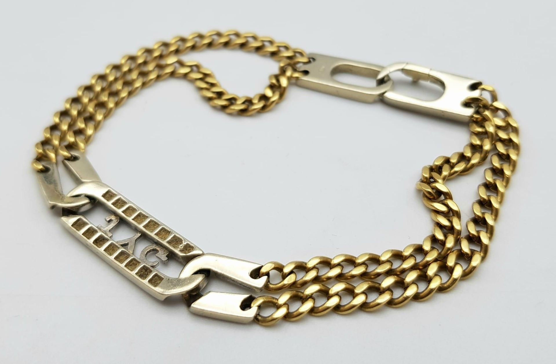 An 18K Yellow and White gold Diamond Bracelet. A double row of flat yellow gold curb links connect - Image 7 of 8