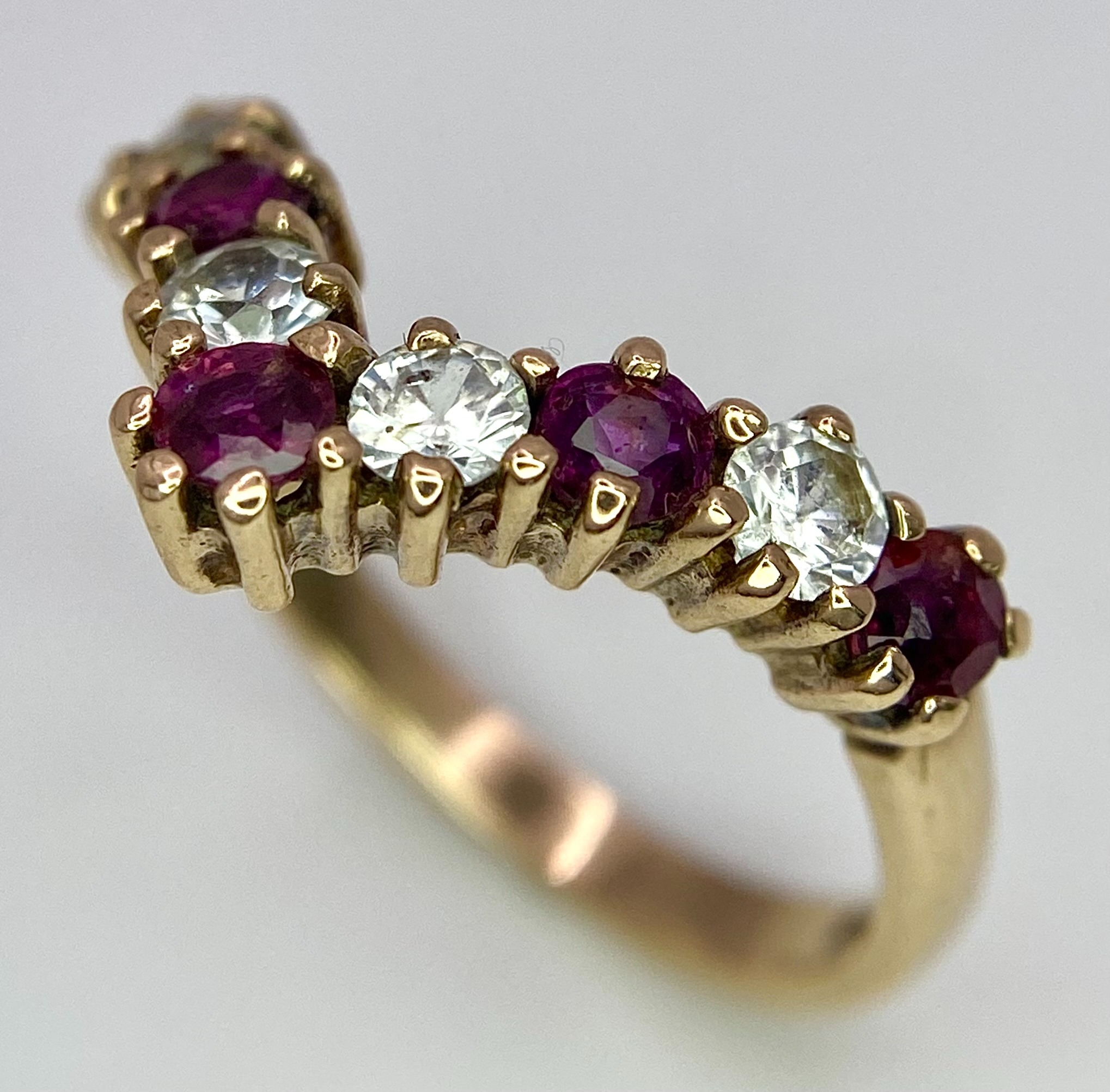 A 9ct Yellow Gold Clear and Red Stone Set Ring, size N, 3.1g weight. ref: SH1469I