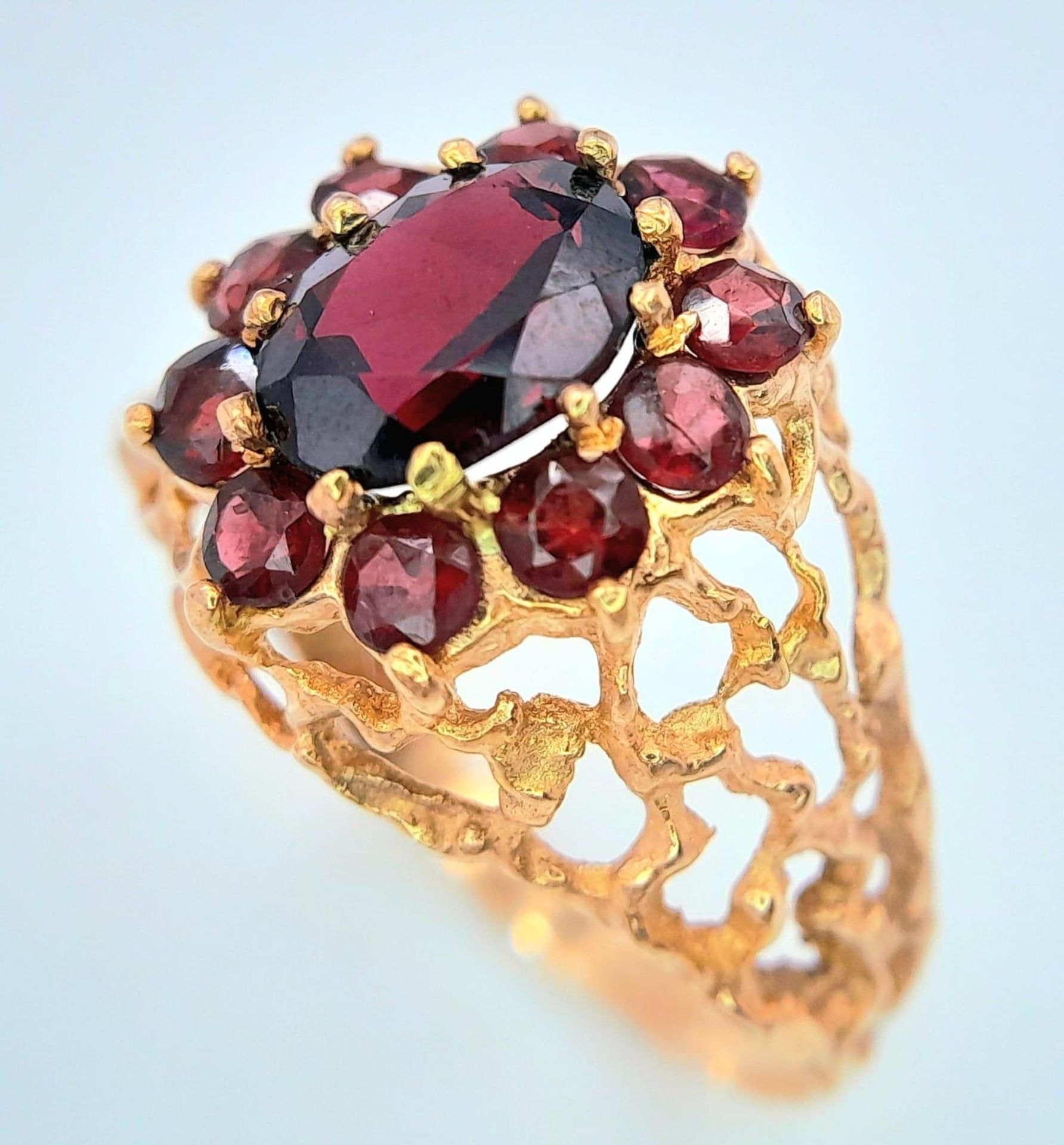 A vintage oval cluster garnet 9ct gold ring surrounded by a halo of bright red garnets in a - Bild 2 aus 6