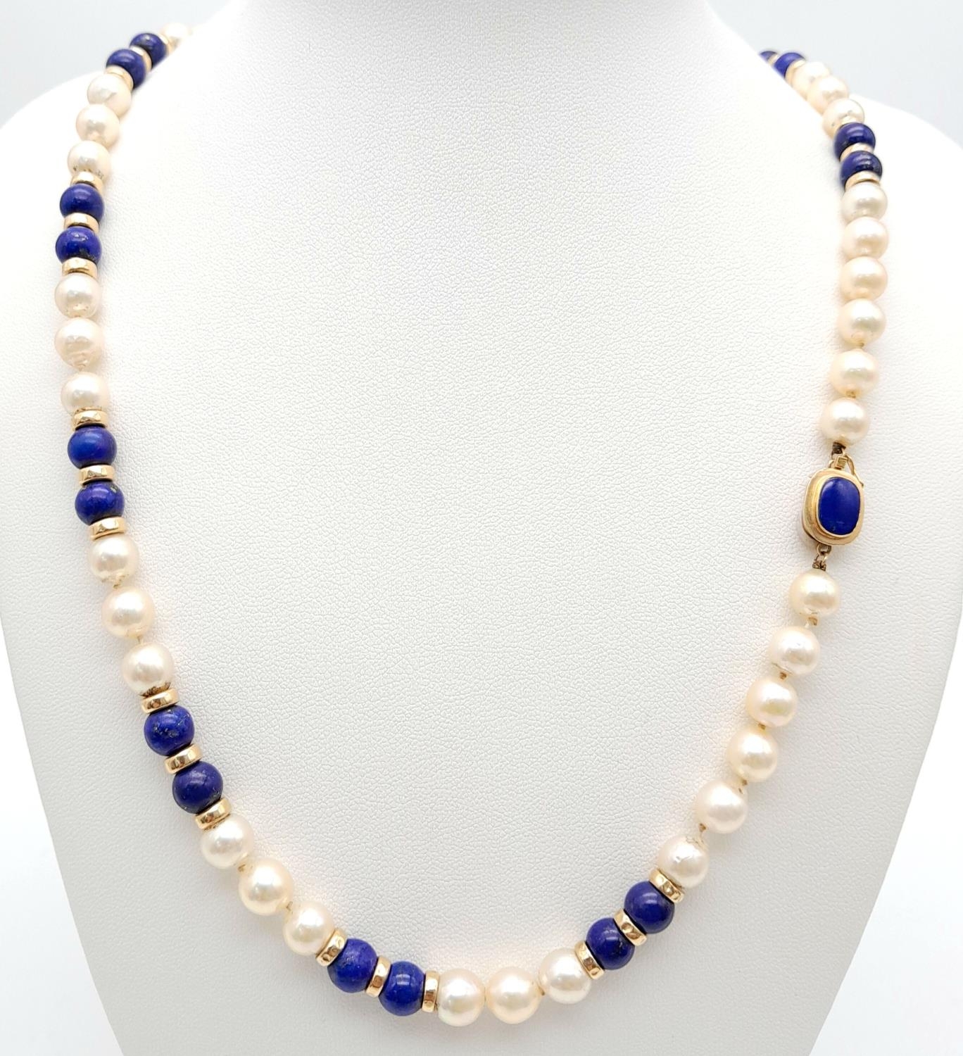 A Lapis and Pearl Necklace with 14K Gold Spacers and Clasp. 68cm