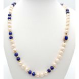 A Lapis and Pearl Necklace with 14K Gold Spacers and Clasp. 68cm