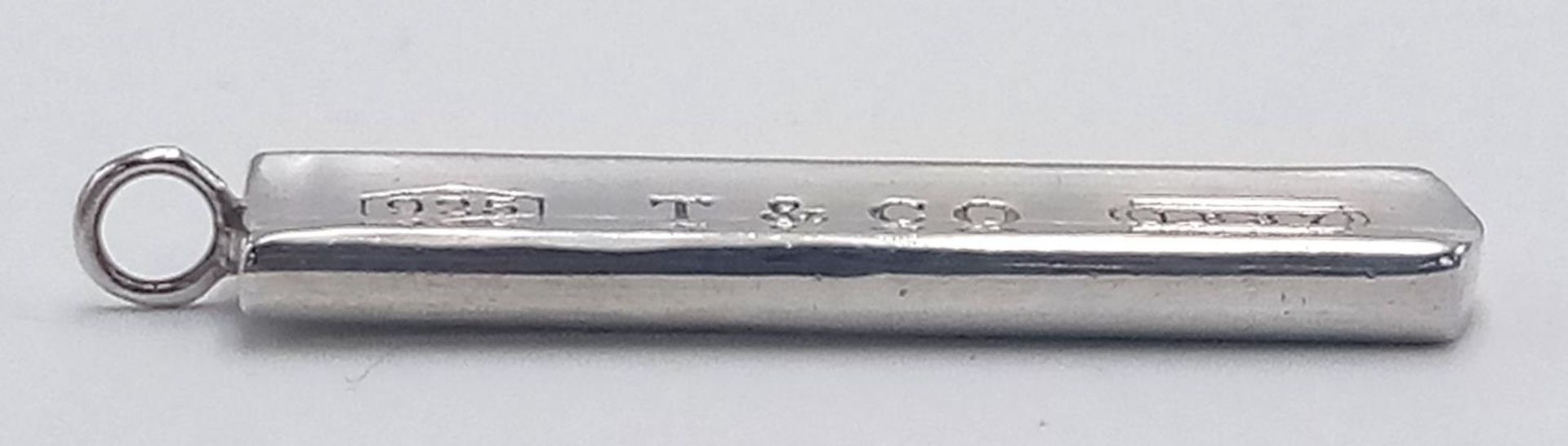 A TIFFANY & CO STERLING SILVER PENDANT 7.5G , 39mm x 8mm. SC 9093 - Image 3 of 4
