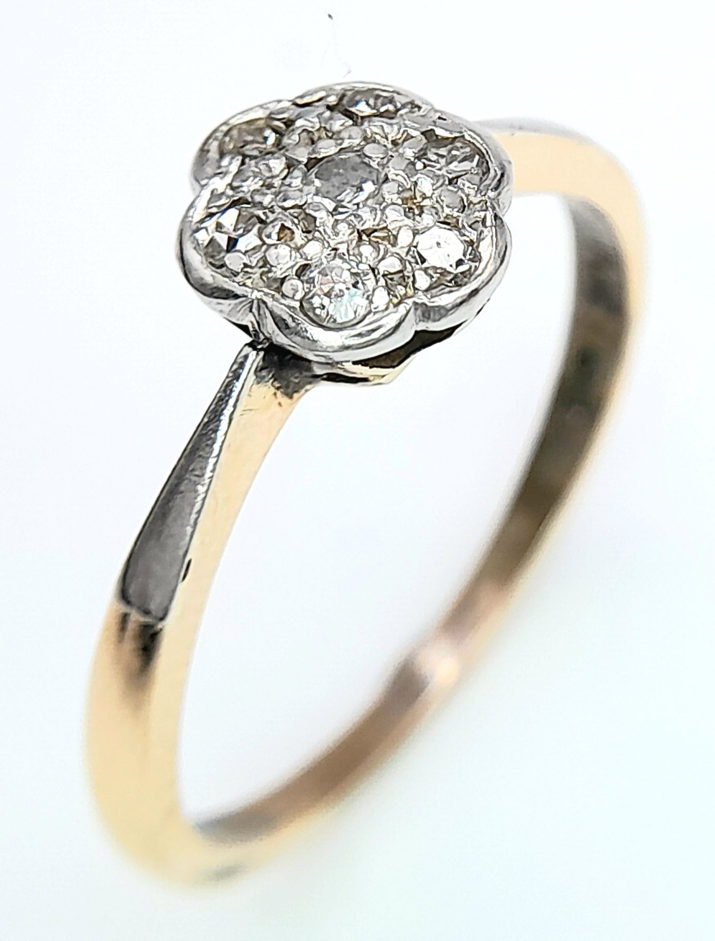 AN 18K YELLOW GOLD & PLATINUM VINTAGE DIAMOND CLUSTER RING. Size R, 3.1g total weight. Ref: SC 8065