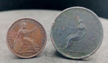 An 1821 George III Farthing and an 1806 Half Penny.