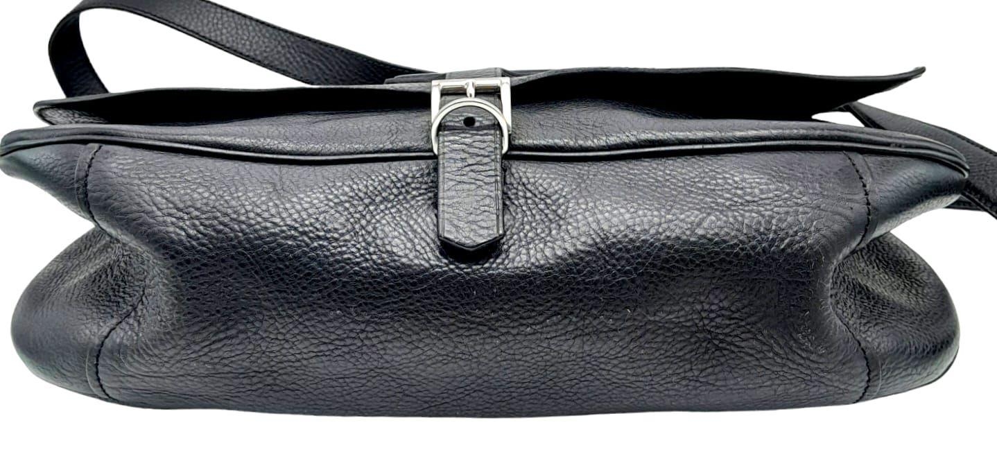 A Prada Black Leather Crossbody Satchel Bag. Textured exterior with buckled flap. Spacious leather - Image 4 of 14