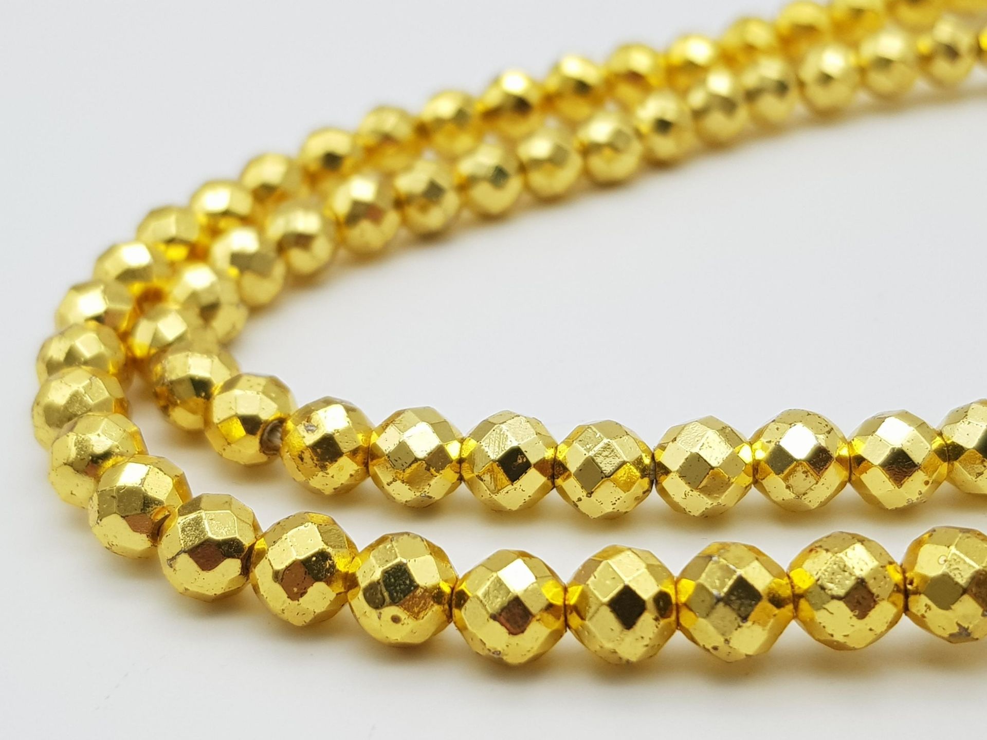 A Limited Edition (1 of 200), 679.65 Carat, Gold Haematite Bead Necklace. Fully Certified - Image 3 of 5