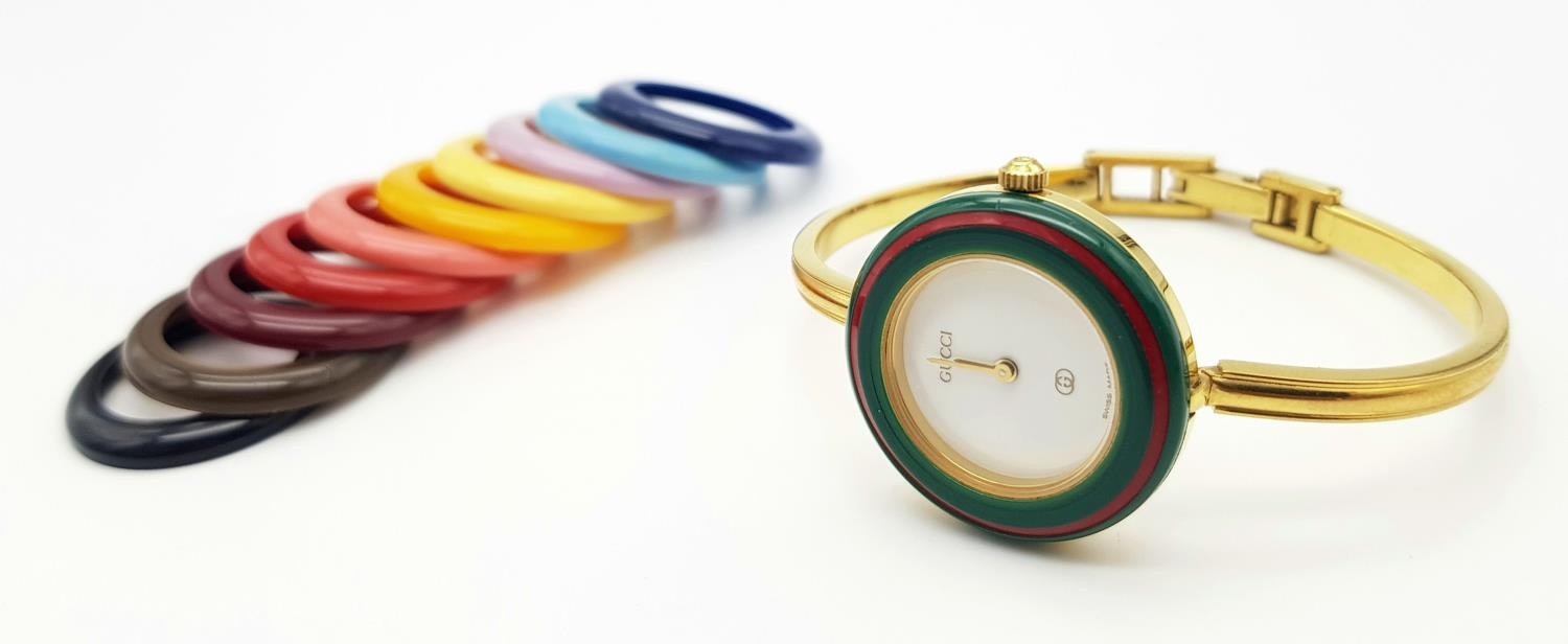 A Gucci Rainbow Bezel Multi-Change Quartz Ladies Watch. Comes with original warranty. Needs a - Image 2 of 5