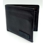 A dark brown leather Gucci card wallet, 3 card holders with a popper pocket. Size approx.