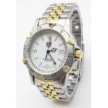 A Tag Heuer Professional Quartz Divers Watch. Two tone bracelet and case - 37mm, White dial with