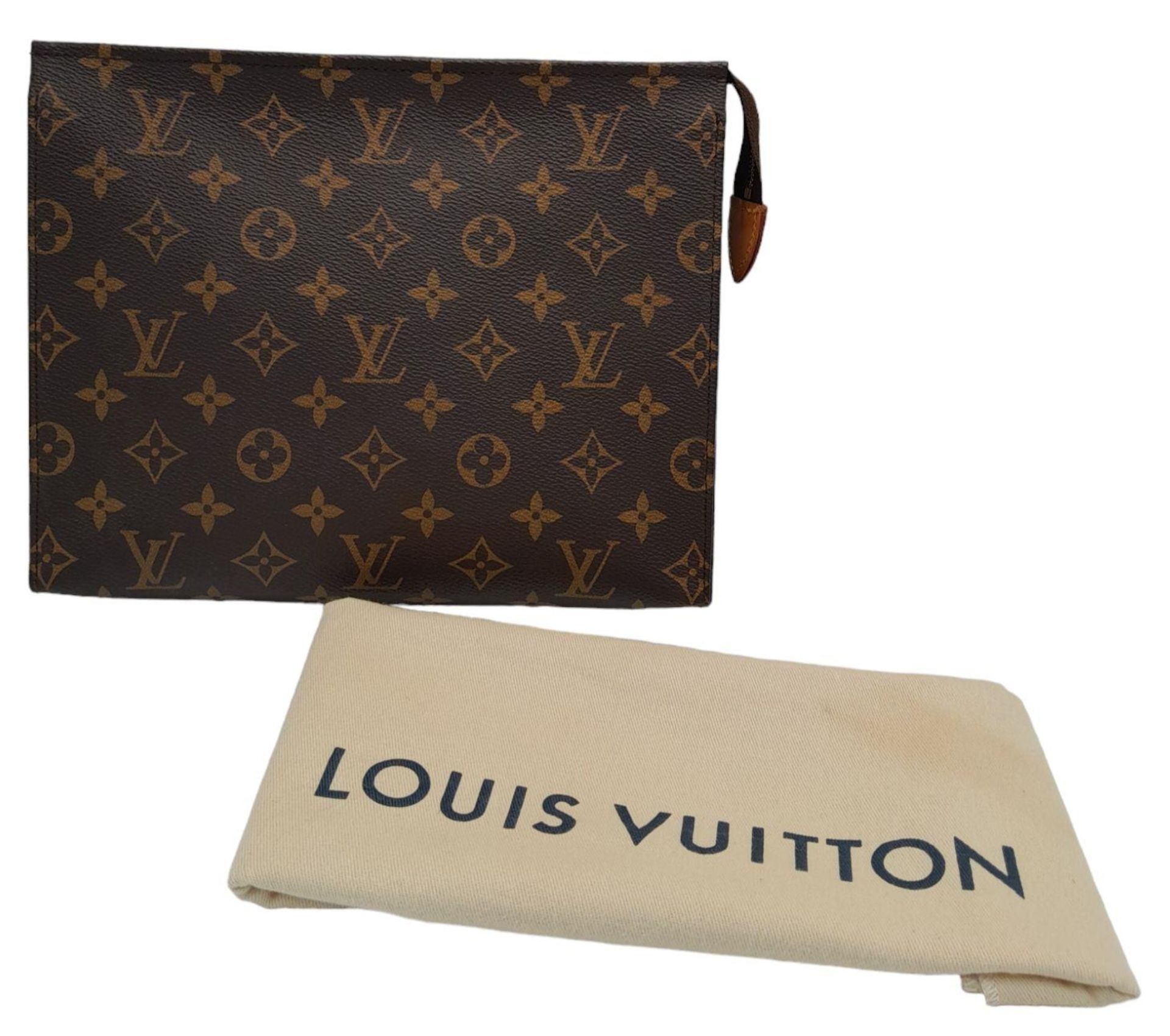 A Louis Vuitton Toiletries Pouch. Monogramed canvas exterior with gold-toned hardware and zipped top - Image 9 of 9