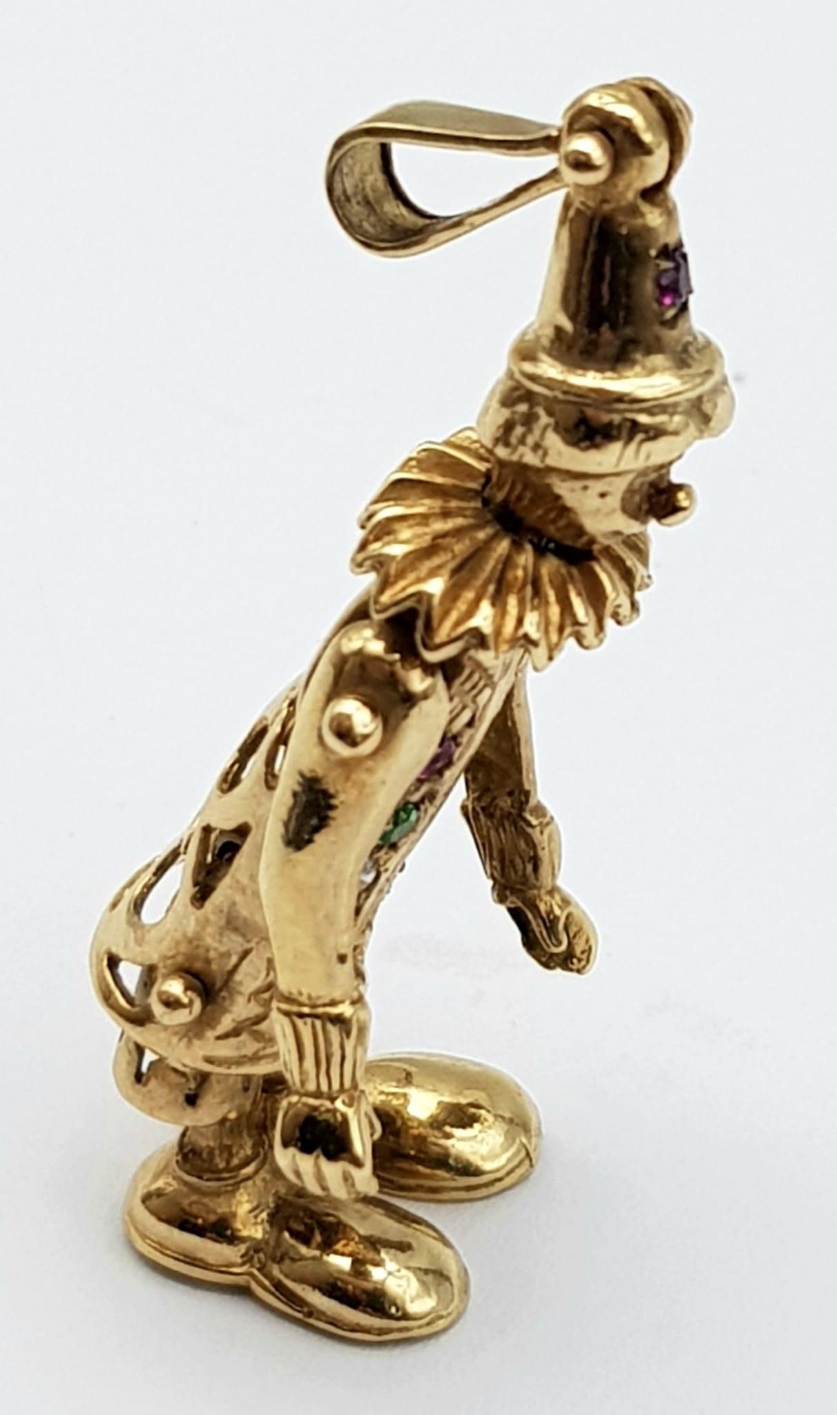 An Articulated 9K Yellow Gold Gem-set Clown Pendant. Two rows of sapphire, diamond, emerald and Ruby - Image 2 of 6