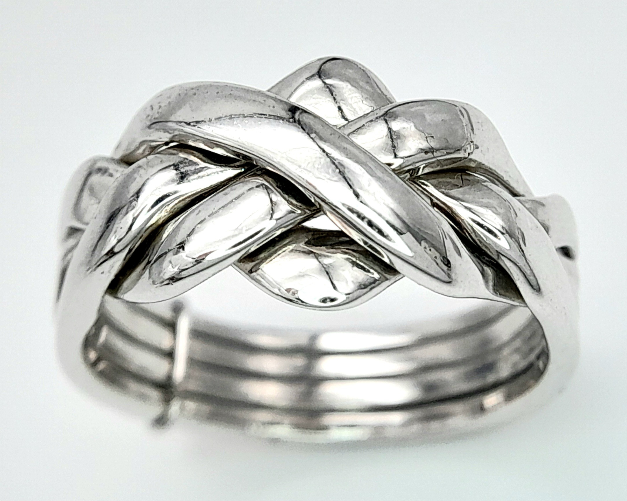 A 9K WHITE GOLD PUZZLE RING. 5.4G. SIZE N. - Image 2 of 5