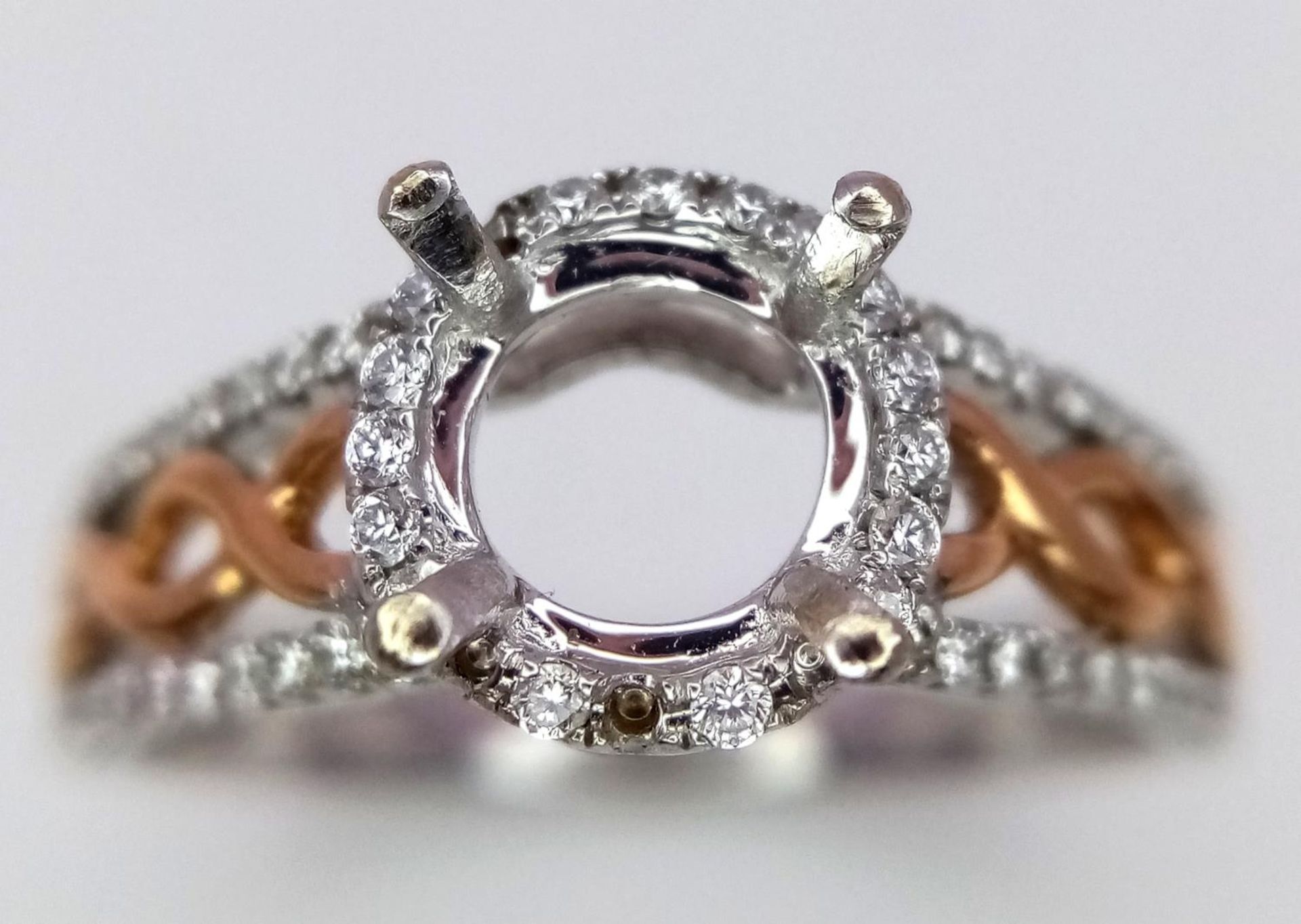 A 18K TWO GOLD TONE DIAMOND SET HALO RING WITH DIAMOND SPLIT SHOULDERS. 0.26CT DIAMONDS. READY TO - Image 7 of 8