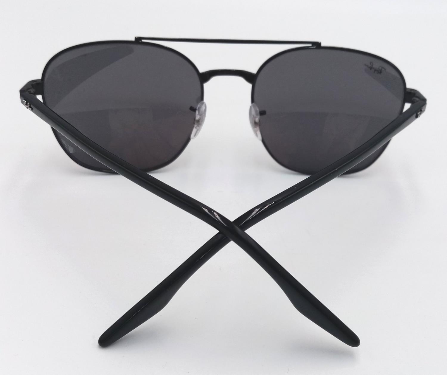 A Pair of Ray.Ban Sunglasses with Case.