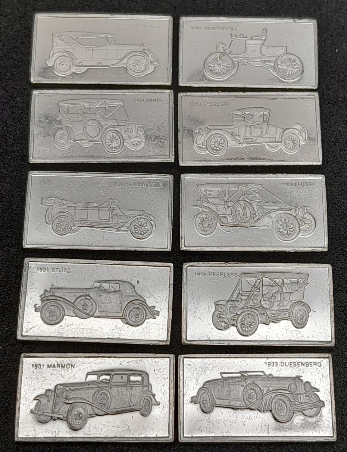 A SELECTION OF 10 STERLING SILVER US CAR MANUFACTURER PLAQUES LOCOMOBILE, LOZIER, DUESENBERG,