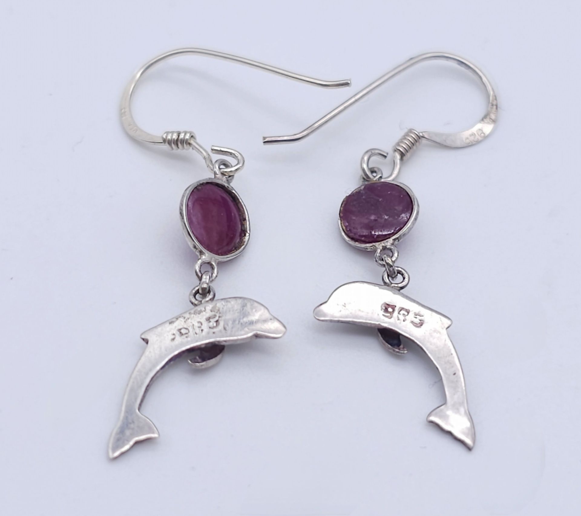A Pair of Sterling Silver Ruby Set Dolphin Pendant Earrings. 2.5cm Drop. Set with 5mm Round Cut Ruby - Image 4 of 5
